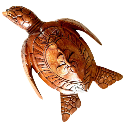 Handcarved wood turtle with hibiscus flower carving