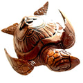 Handcarved wood turtle with hibiscus flower carving